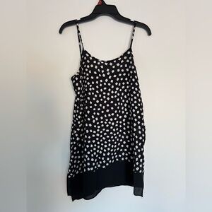 The Limited Asymmetrical Black and White Polka Dot Tank Top